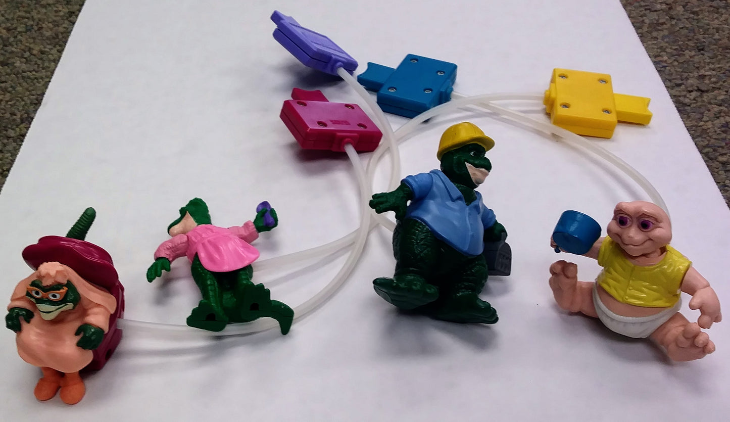 McDonald's Happy Meal toy set - Dinosaurs pump action figures